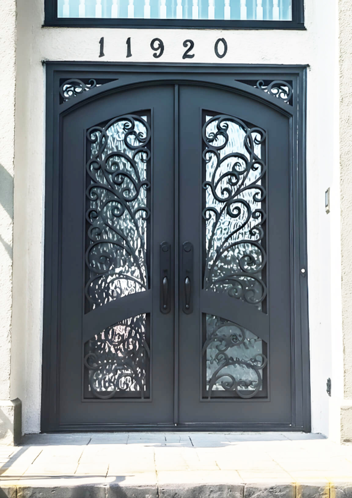 PS2010 — Arched Iron Double Door with Flowing Scrollwork
